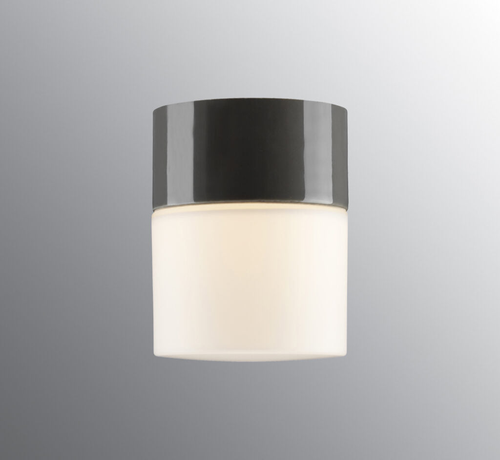 Opus 100/125 Led Porzellan Wand-/Deckenleuchte 2700K grau matt opal vor grauem Hintergrund | Ifö Electric